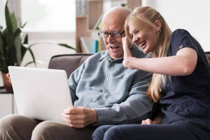 Caregiver comforting senior
